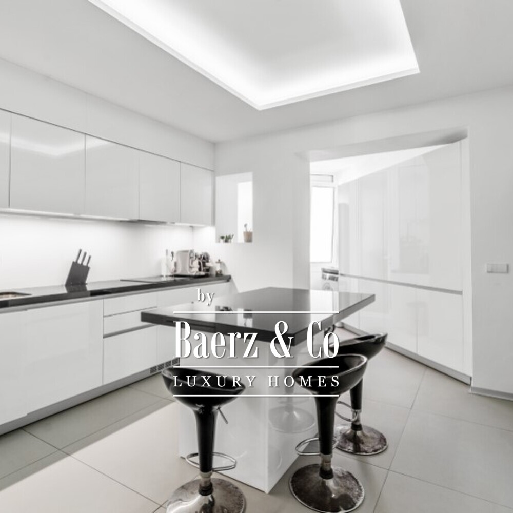 Four-bedroom apartment with a balcony and five-car garage on Avenida da República image