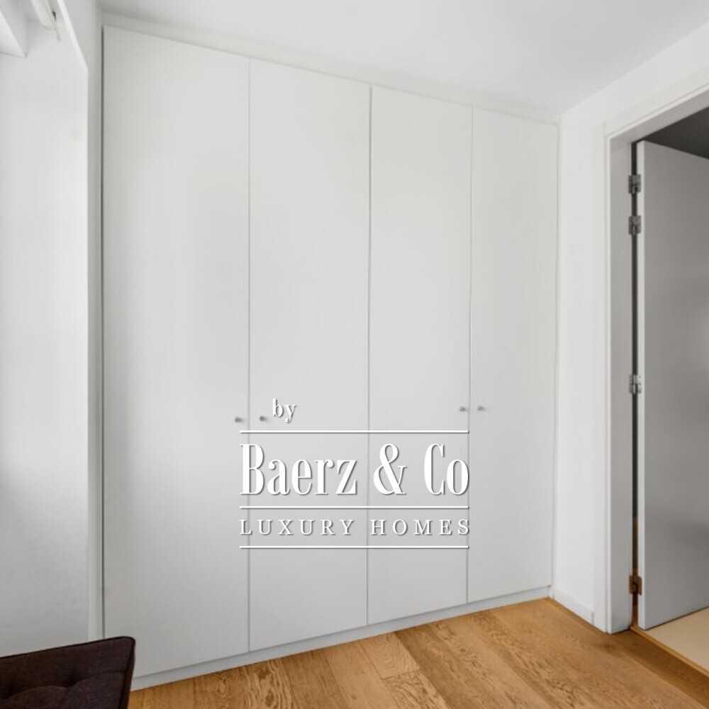 Four-bedroom apartment with a balcony and five-car garage on Avenida da República image