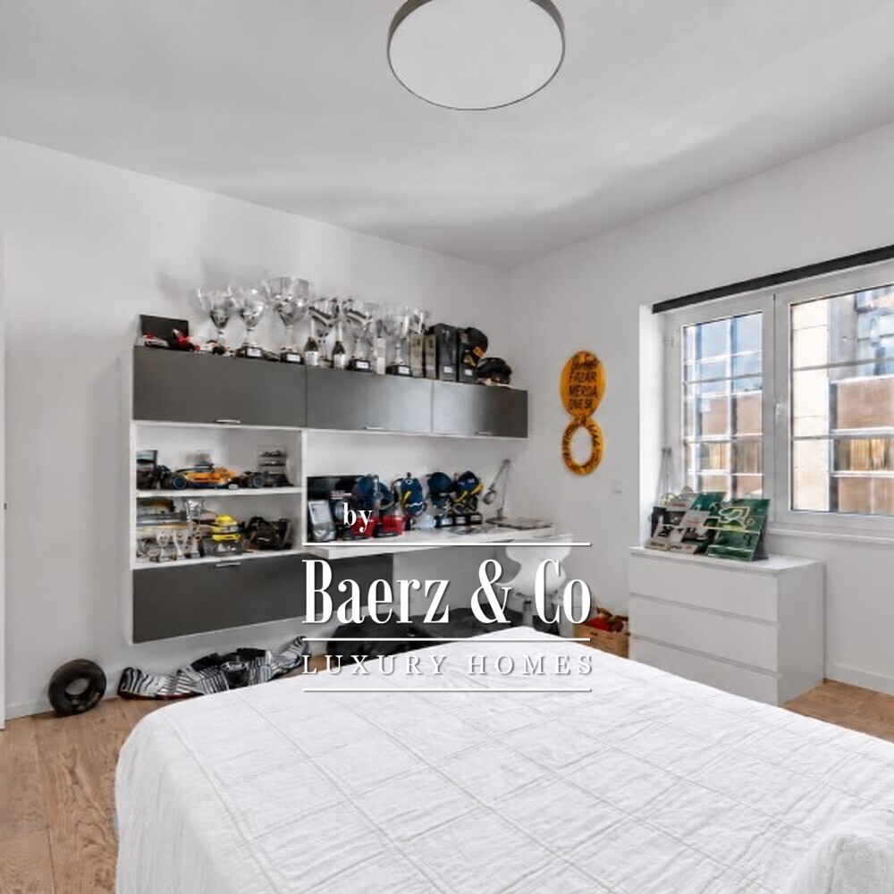 Four-bedroom apartment with a balcony and five-car garage on Avenida da República image