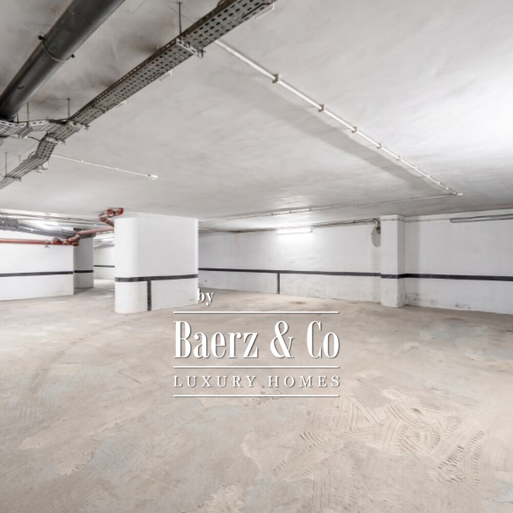 Four-bedroom apartment with a balcony and five-car garage on Avenida da República image