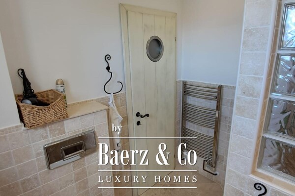 photo 14 Brač, Supetar, a house with a total area of 372 m² located on a plot of 411 m².