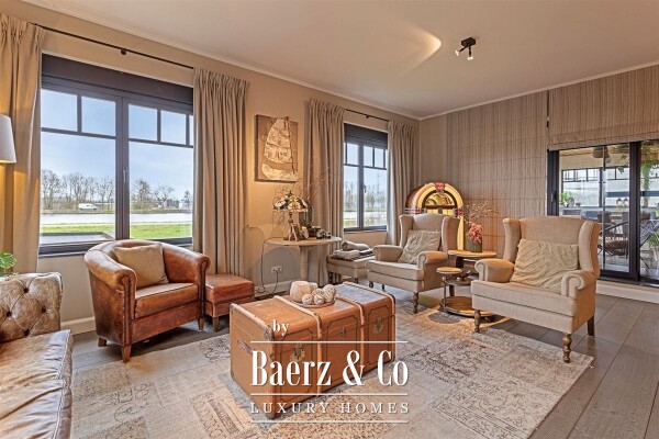 photo 12 Uitzonderlijke Duplex met zicht op kanaal, garage, carport en ruime (wijn)kelder!