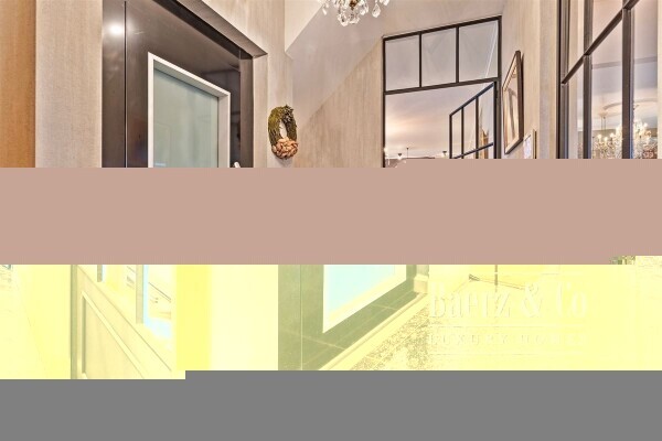 photo 4 Uitzonderlijke Duplex met zicht op kanaal, garage, carport en ruime (wijn)kelder!