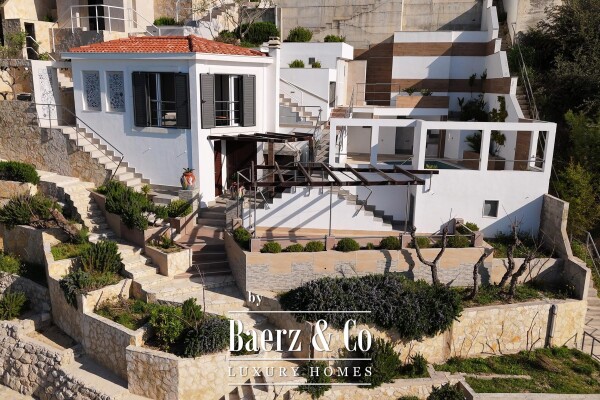 photo 1 Omiš, Stanići, exclusive villa first row to the sea