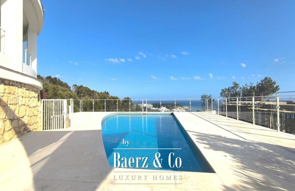photo 2 EXCLUSIVE MEDITERRANEAN VILLA WITH HEATED SWIMMING POOL, TOURIST LICENCE AND SPECTACULAR SEA VIEWS IN SANTO TOMÁS, MENORCA