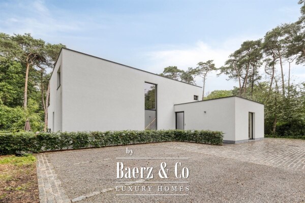 photo 1 Exclusieve villa met homecinema en hoogwaardige afwerking op toplocatie in Heide!