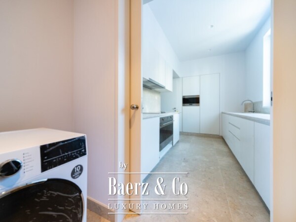 photo 9 Three-Bedroom Duplex with Balcony, Two Parking Spaces, and Storage Room
