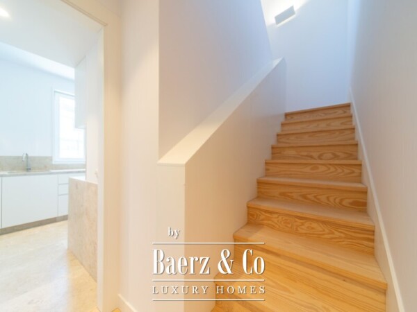 photo 11 Three-Bedroom Duplex with Balcony, Two Parking Spaces, and Storage Room