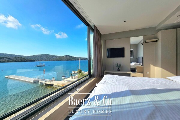 photo 1 Tisno, modern villa with a swimming pool, first row to the sea