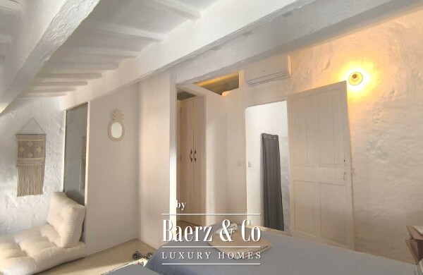 photo 22 RENOVATED MENORCAN HOUSE FOR SALE IN THE HISTORIC OLD TOWN OF CIUTADELLA, MENORCA – COURTYARD WITH SWIMMING POOL, 4 EN-SUITE BEDROOMS AND ORIGINAL ARCHITECTURAL FEATURES
