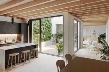 Private patio residence with expansive living spaces and rooftop solarium